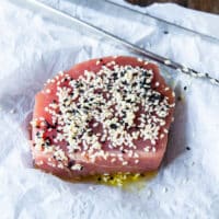 Tuna seasoned with black and white sesame seeds on both sides