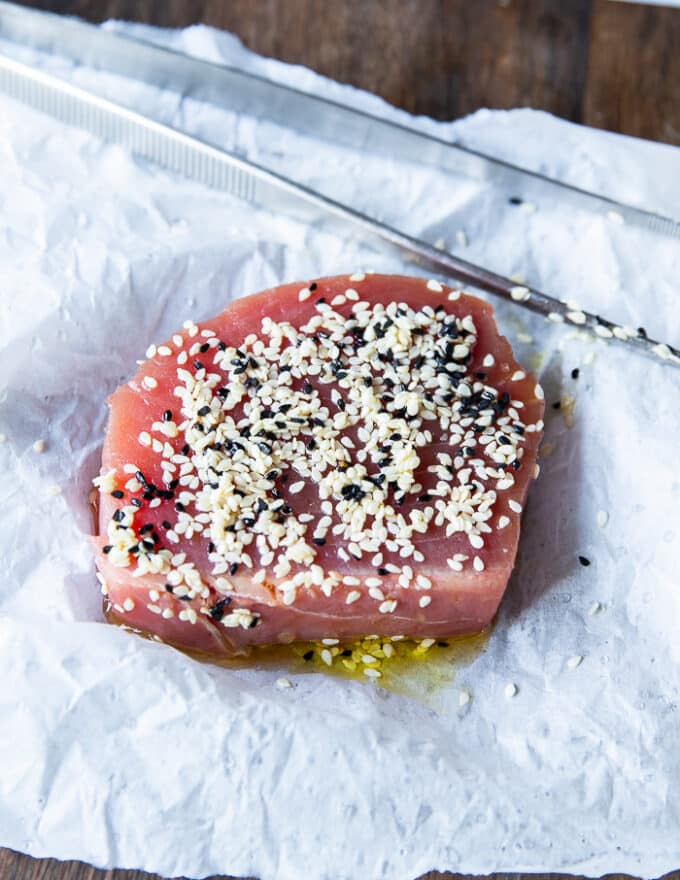 Tuna seasoned with black and white sesame seeds on both sides 